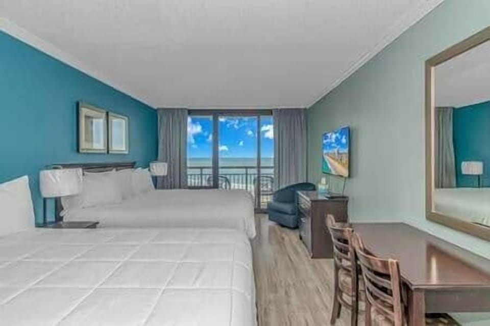 Two comfortable beds- King and Queen, with direct oceanfront views—wake up to sunrise over the Atlan