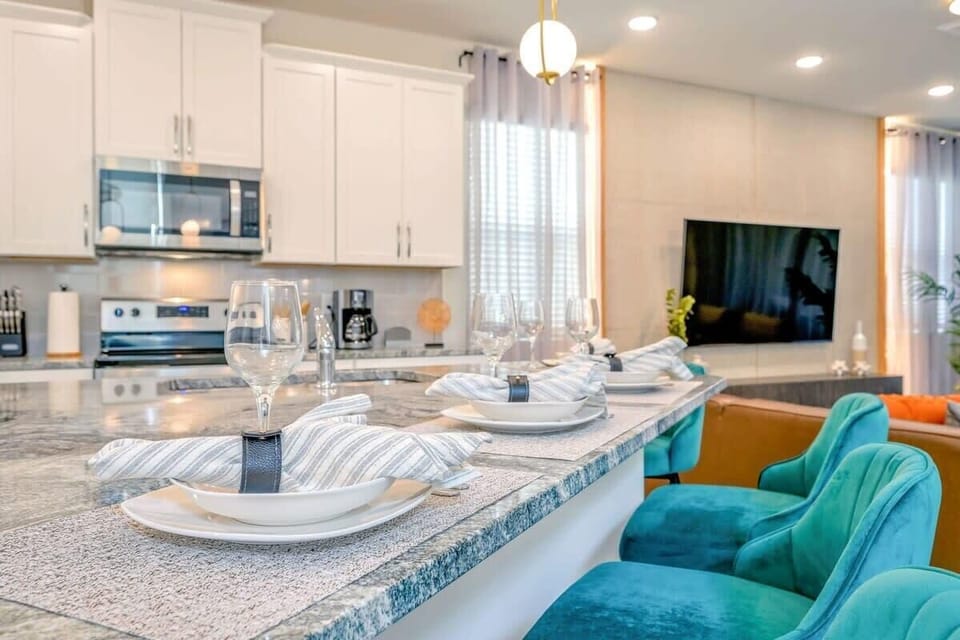Relax at the kitchen island with plush, comfortable bar stools.