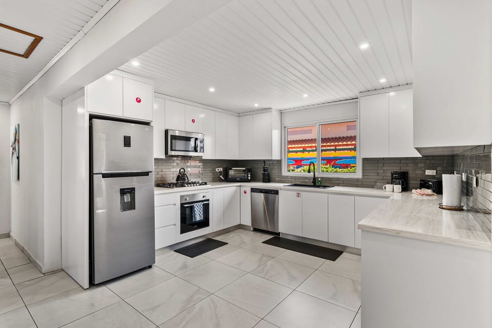 Discover the joy of cooking in our fully equipped kitchen, where every tool and gadget awaits to bring your culinary creations to life. From amateur chefs to seasoned pros, this space has everything you need to unleash your inner chef!