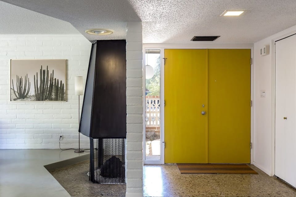 Front entrance with closet and polished concrete floors 