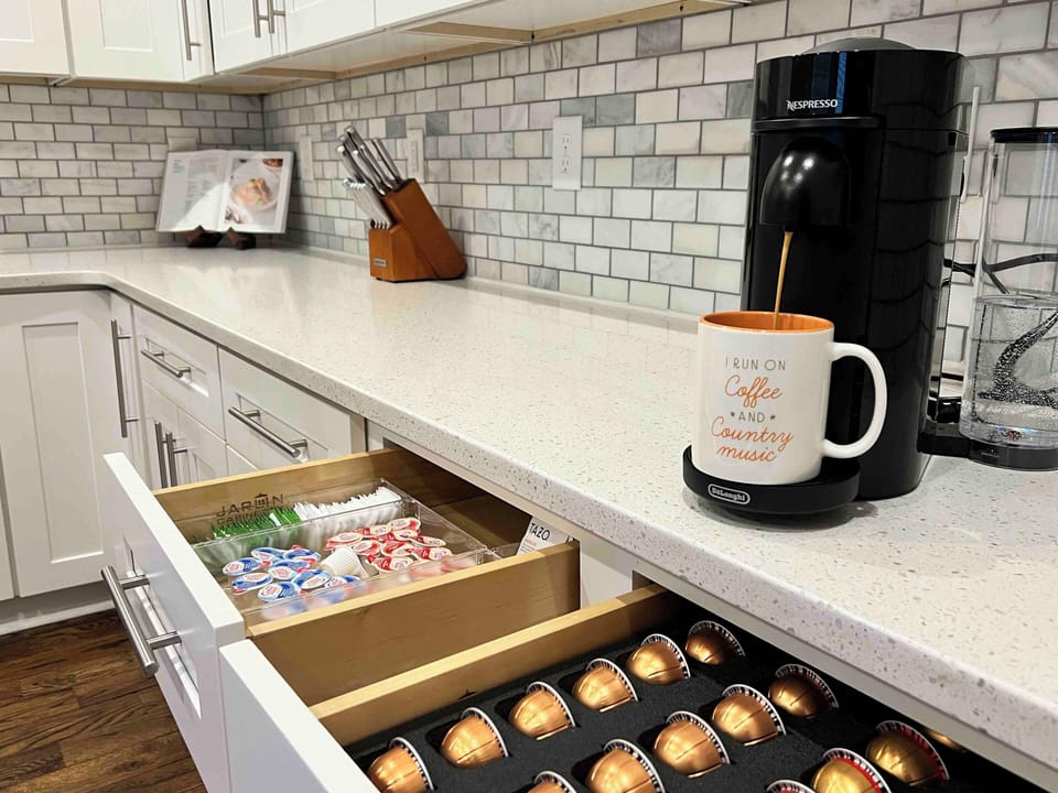 Unlimited Nespresso coffee & tea, milk frother, creamers, sugars included
