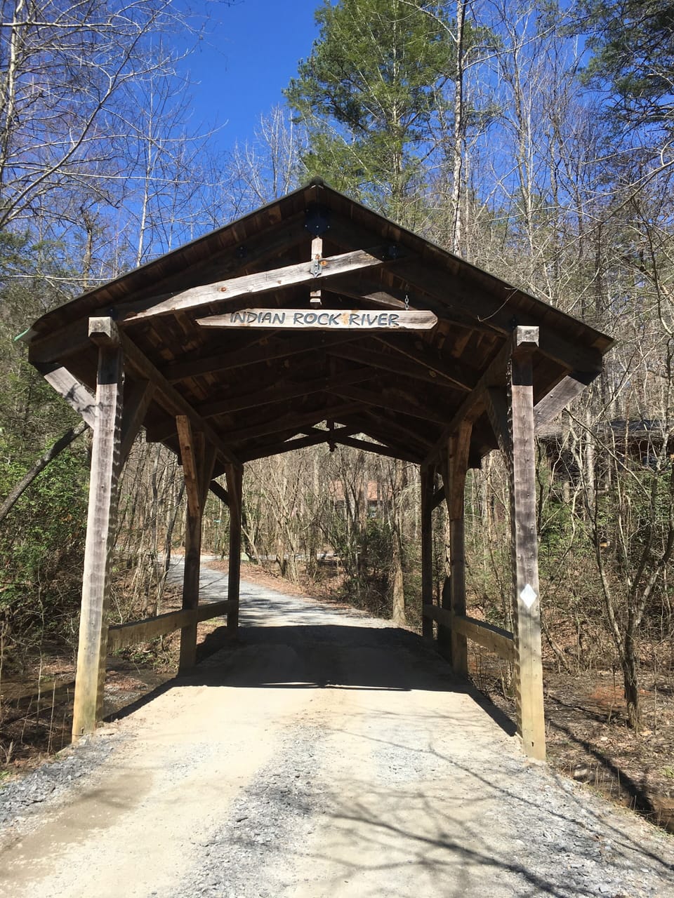 Covered bridge by the lake