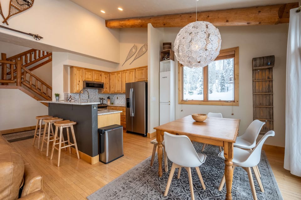 Open living area leads into the dining room and kitchen