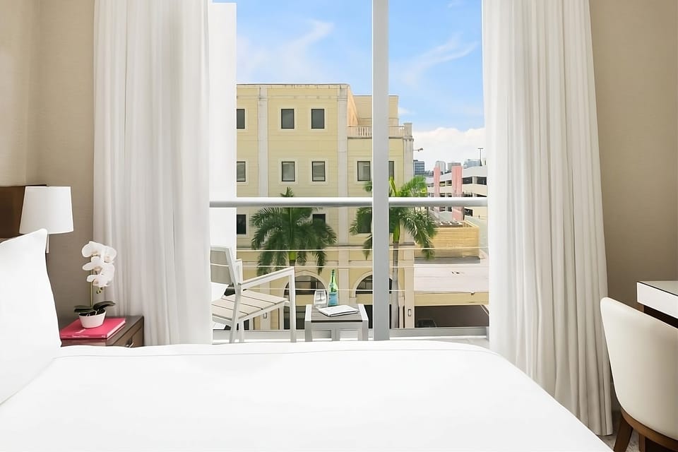 Wake up to sunshine and sip coffee on your balcony.
