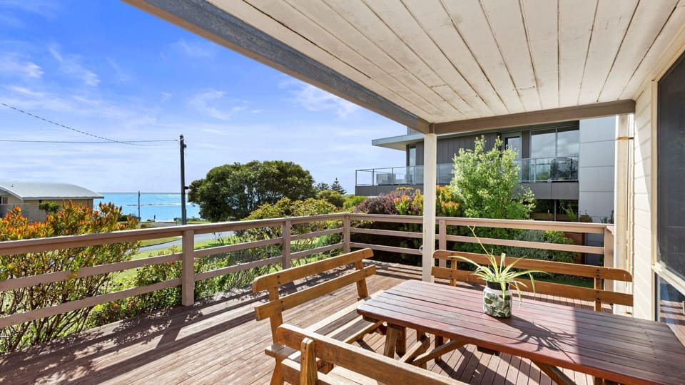 Expansive deck with sweeping ocean views