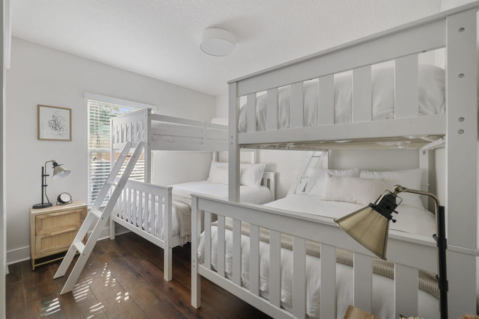 Guest bedroom #3 featuring two twin-over-full bunk beds.  Plenty of sleeping space for families or larger groups.