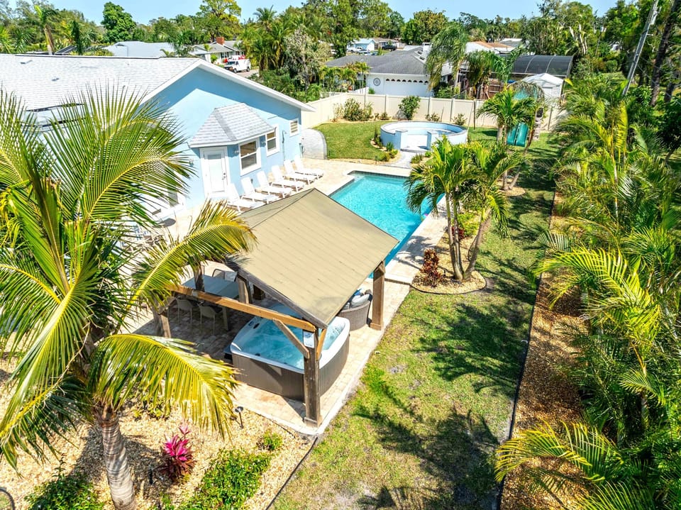 Soak up the view from above! Royal Palms offers the perfect blend of luxury and leisure, a stunning pool, inviting covered hot tub, and plenty of space to unwind under the sun.
