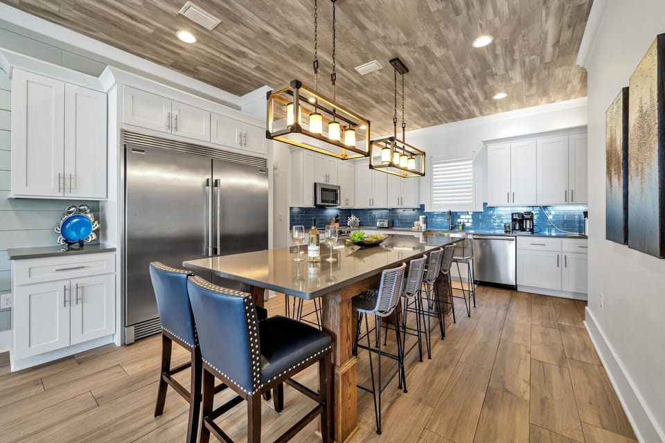 Spacious chef's kitchen with seating for 14