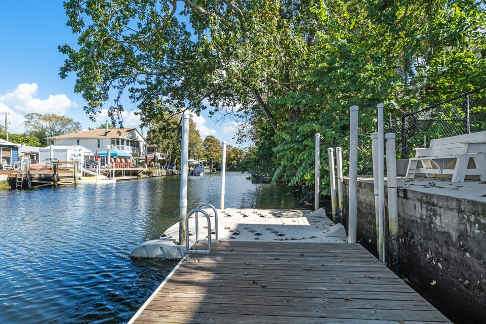 We suggest launching Kayaks off this plastic dock. Sit and push yourself off. 