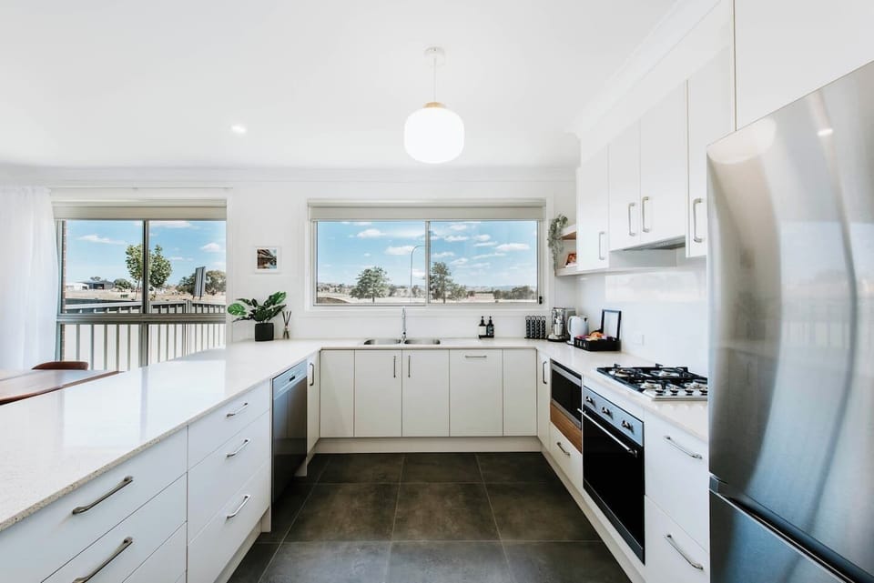Light and airy kitchen equipped with everything to meet the needs of even the most skilled chef. 
