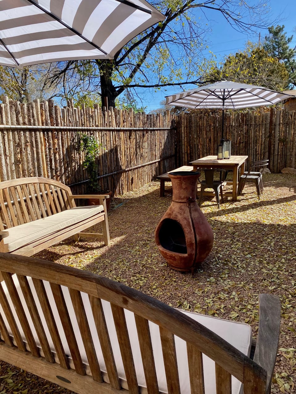 Private patio with chimenea, outdoor dining and propane grill.