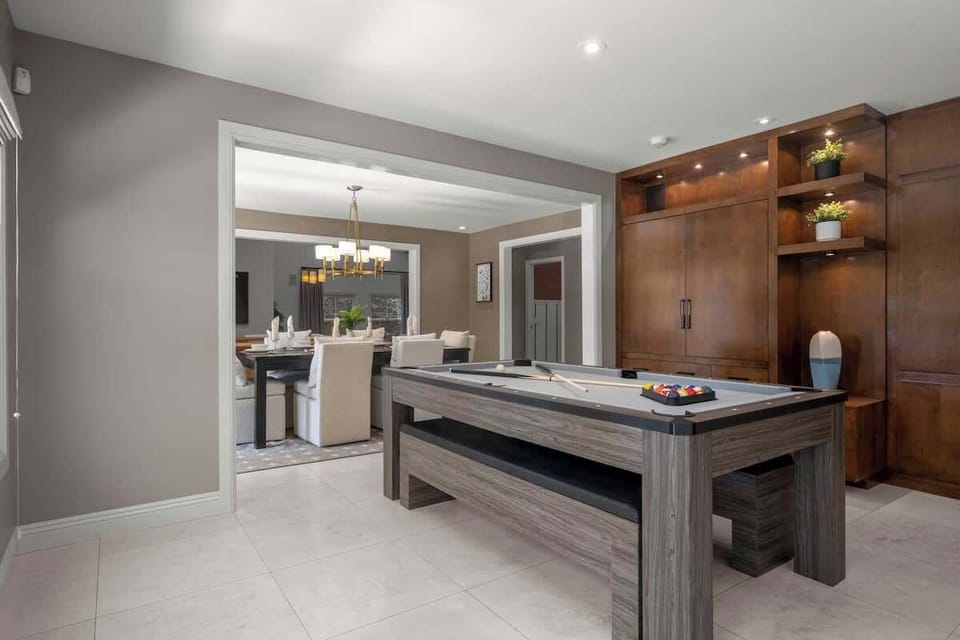 The pool table also turns into a ping-pong table and an additional dining table if you have larger dinner parties.