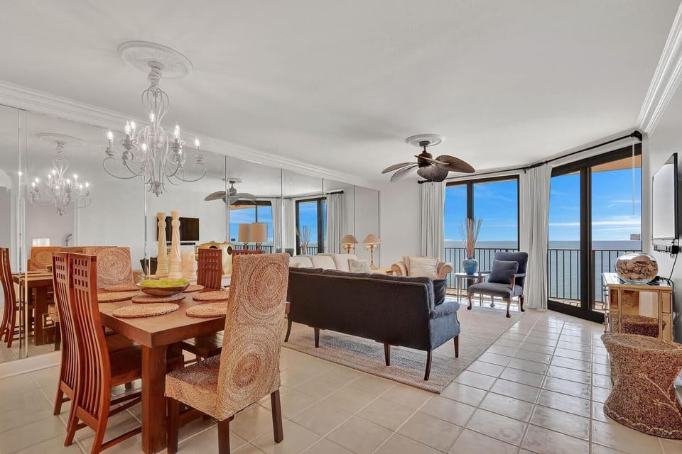 The combined living and dining area exudes luxury, offering a seamless blend of elegance and comfort.