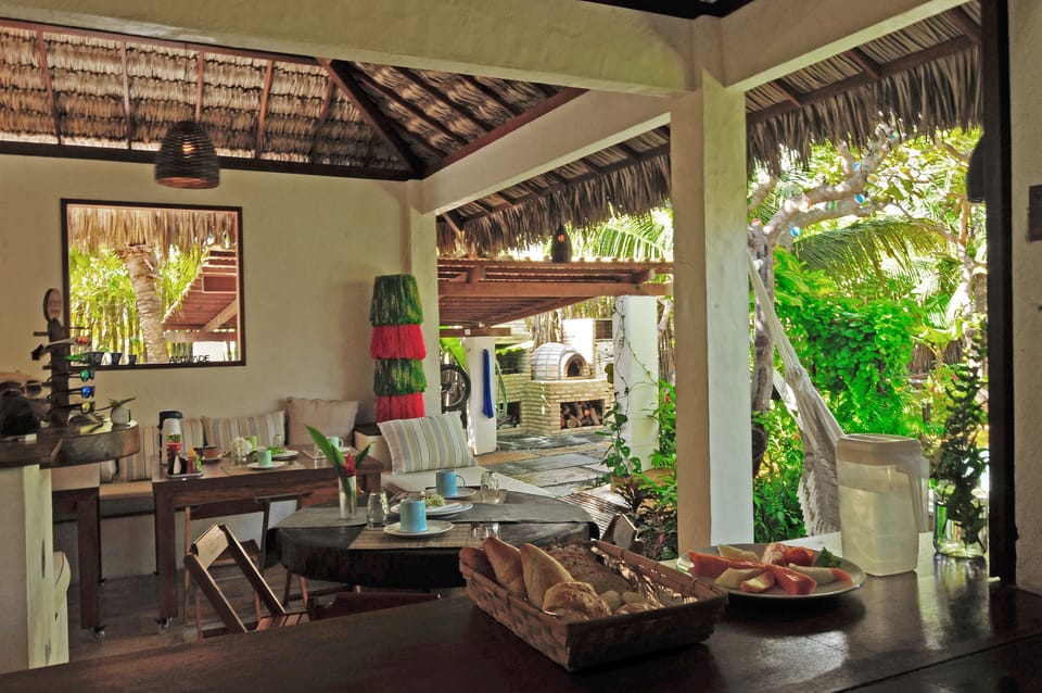 View from kitchen, multi level open lounge and desk. All open on the pool area.