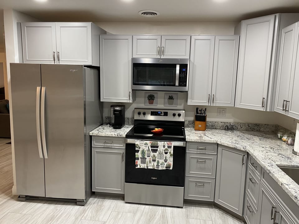 K cup Keurig, full size fridge, oven, and microwave, and dish washer 