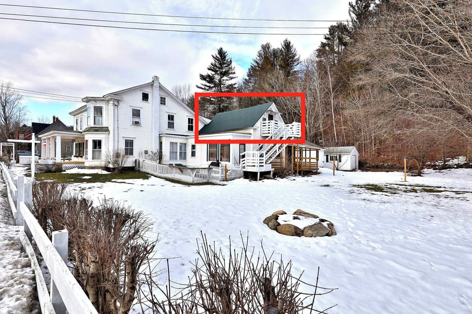 Ski VT overlooks large backyard boasting 3 season fire pit and views of the Ottaqueechee River (Note: We just purchased this property. Please excuse our outdoor appearance at the moment - it is undergoing some aesthetic changes like a sign change, new paint in some areas, etc. However, please rest assured the interior is completely designed, furnished and is well represented in the listing photos)