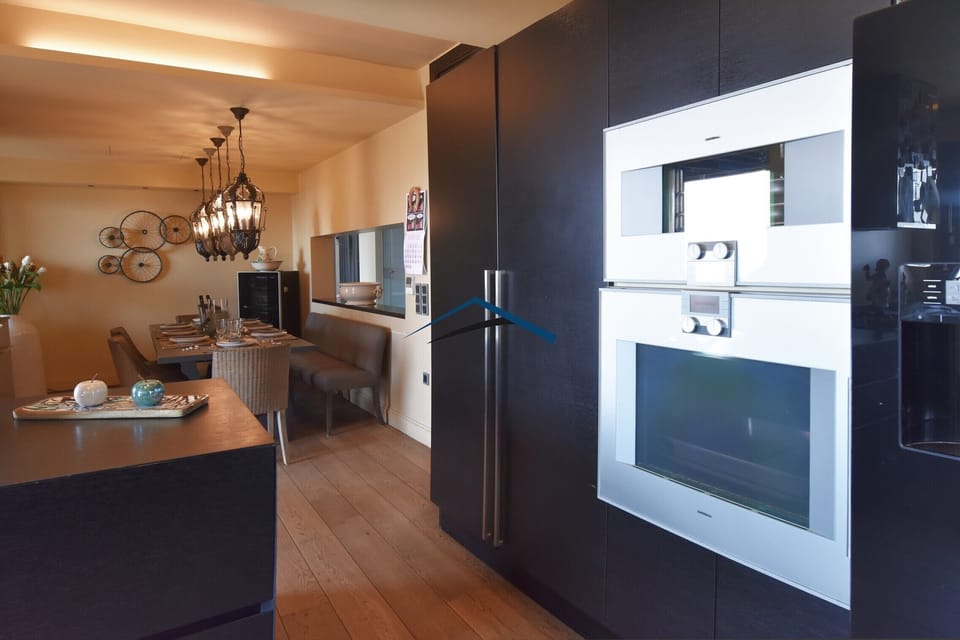 Part of the kitchen and the breakfast room