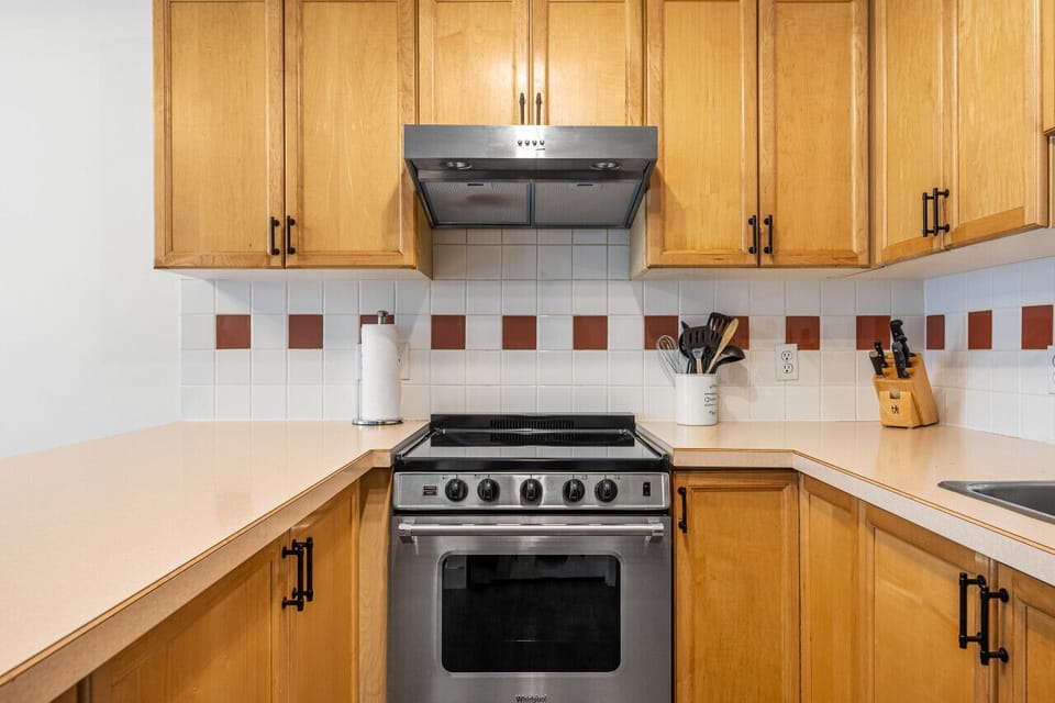 Full kitchen with a drip coffee machine, ground coffee, tea, sugar and basic condiments (ketchup, mustard and relish.)
