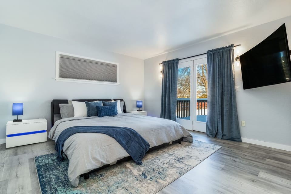 Comfy king bed, closets, smart TV, blackout curtains and access to back deck.