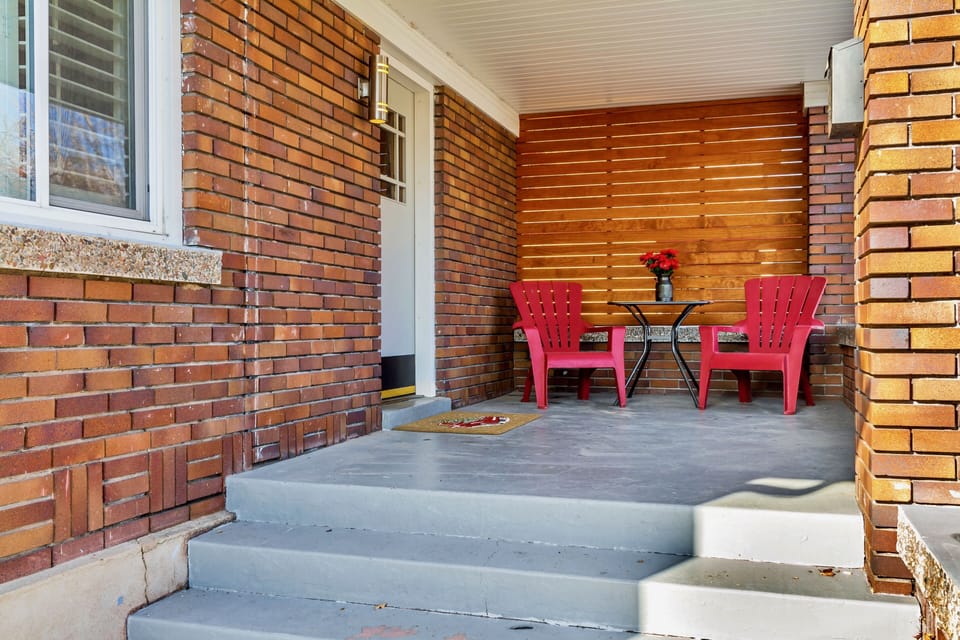 Delightful old-school front porch—welcome, come in!