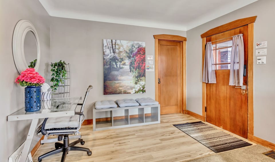 The roomy front entry includes a dedicated workspace.
