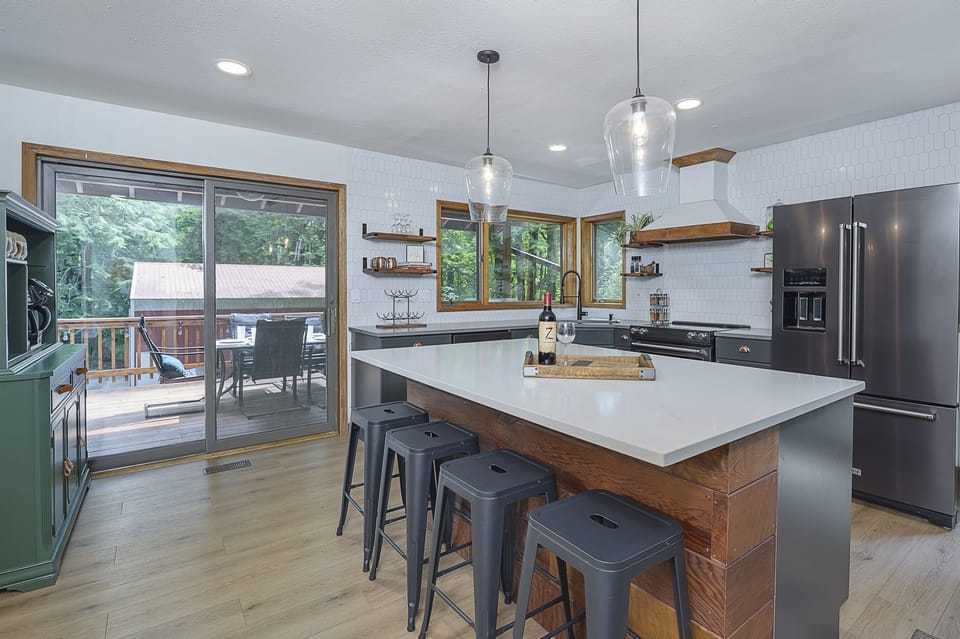 Calling all chefs!  This fully stocked, newly remodeled kitchen has all modern appliances for all of your culinary needs!