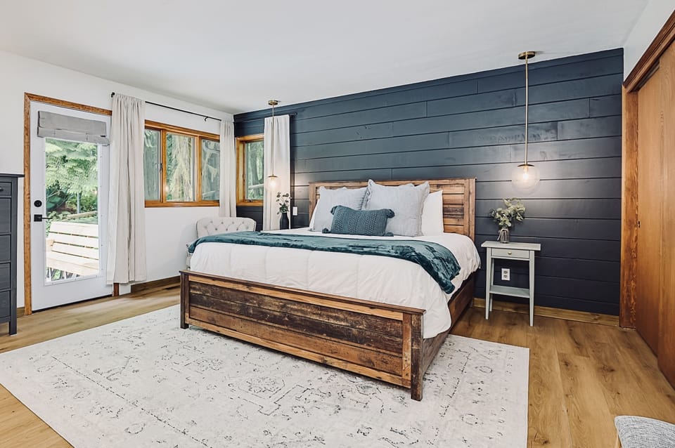 Sleep soundly in the king bed in the Primary Suite.  Enjoy the sun on the back deck with steps to the hot tub and backyard.