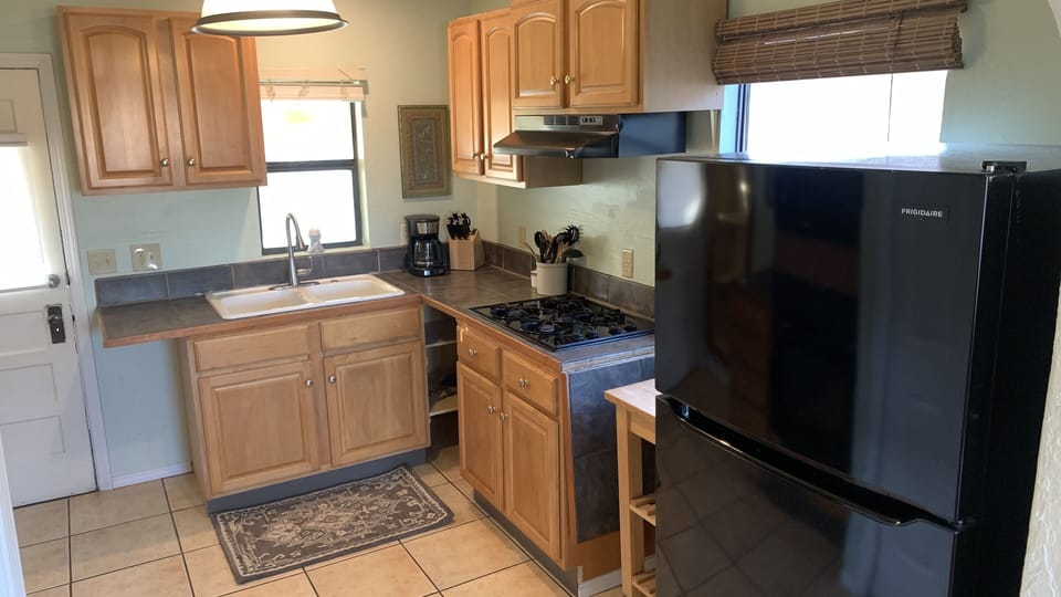 Kitchen with new full sized refrigerator