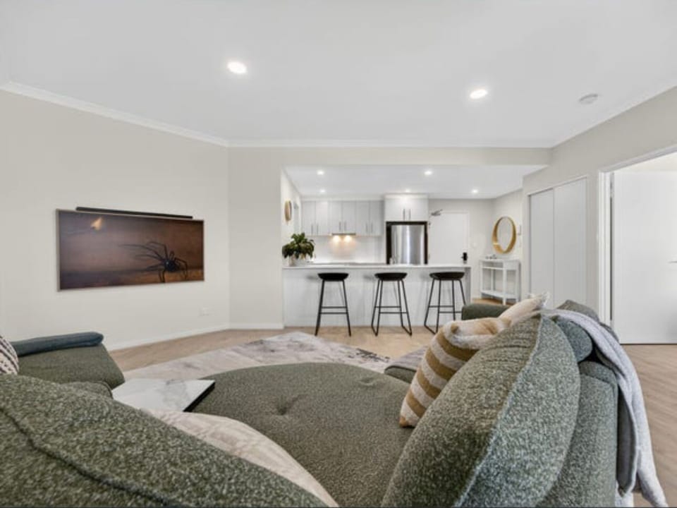 Spacious living room with smart 55" TV.