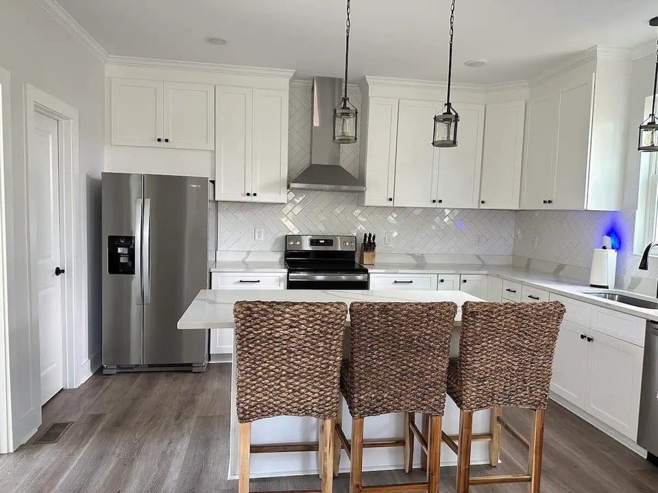 Additional bar seating. Lots off cabinets for storage. New appliances.