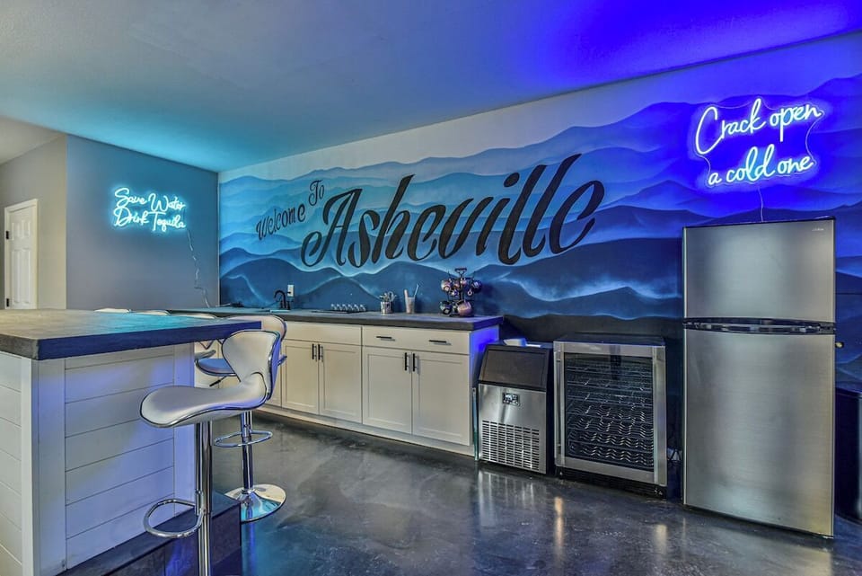 Full bar area - sink, ice maker, cooler, and refrigerator