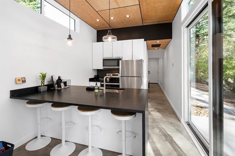 Waterfall counter with barstools