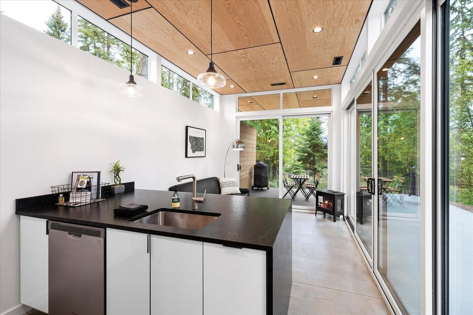 Open concept kitchen and living area with full size appliances