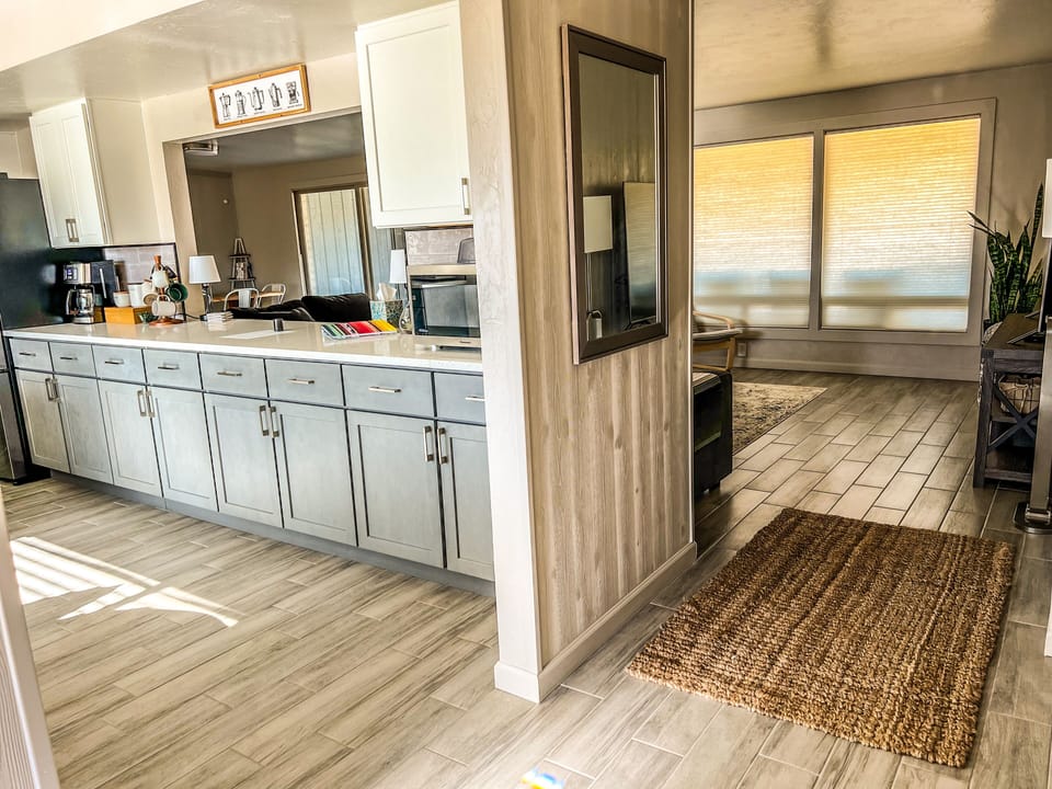 Front door entry to kitchen or living room.