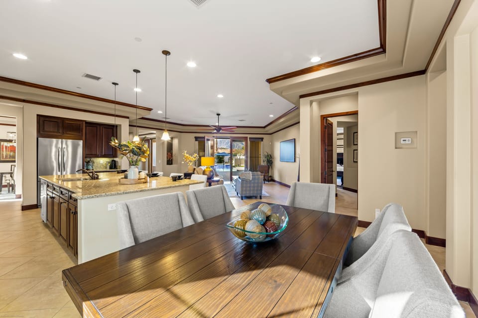 Additional seating for six in the open dining area by kitchen.