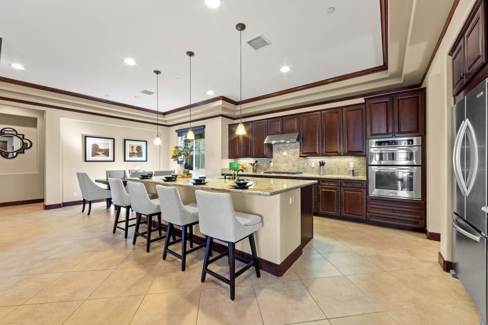 Enjoy breakfast at the island with bar height seating for four.