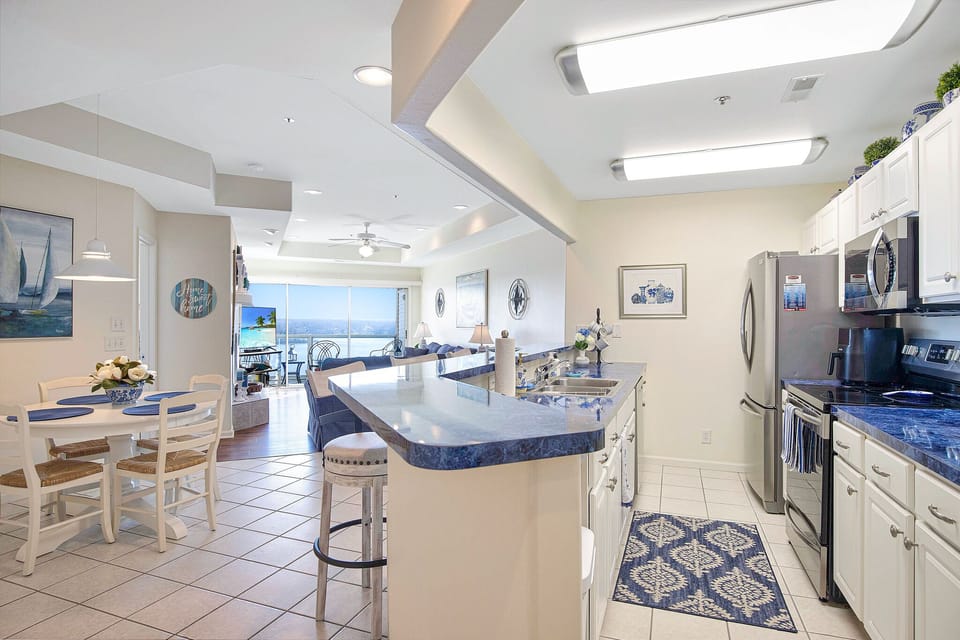 Inset lighting creates a modern feel in the kitchen and dining areas.