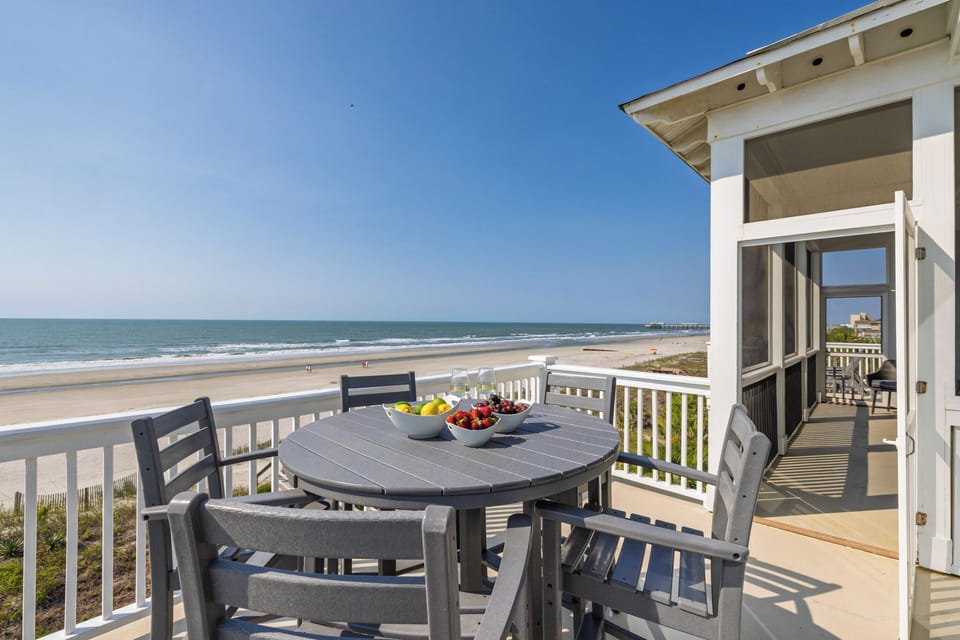 Enjoy morning coffee and coastal breezes on your private oceanfront deck