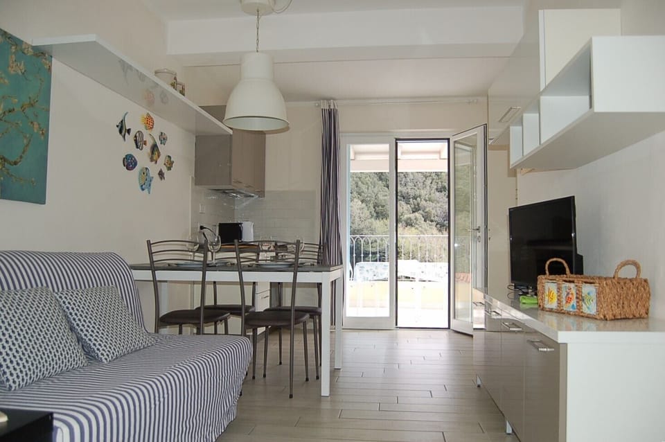 Soggiorno con angolo cottura 