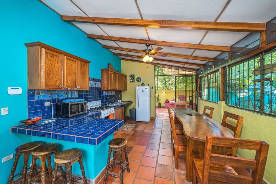Open air kitchen and dining area.