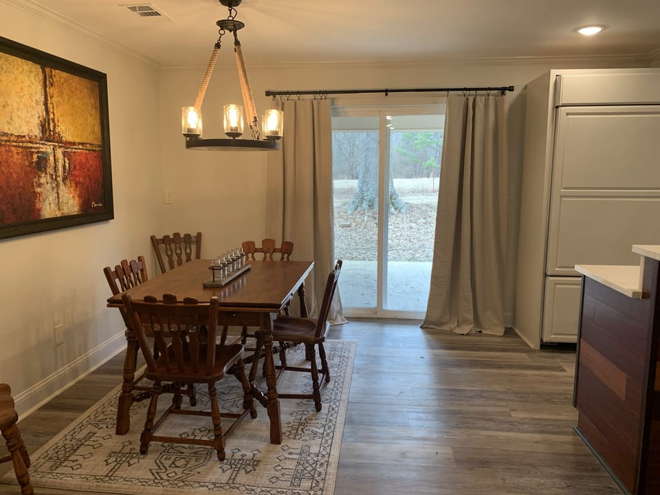 Dining with sliding door access to back patio