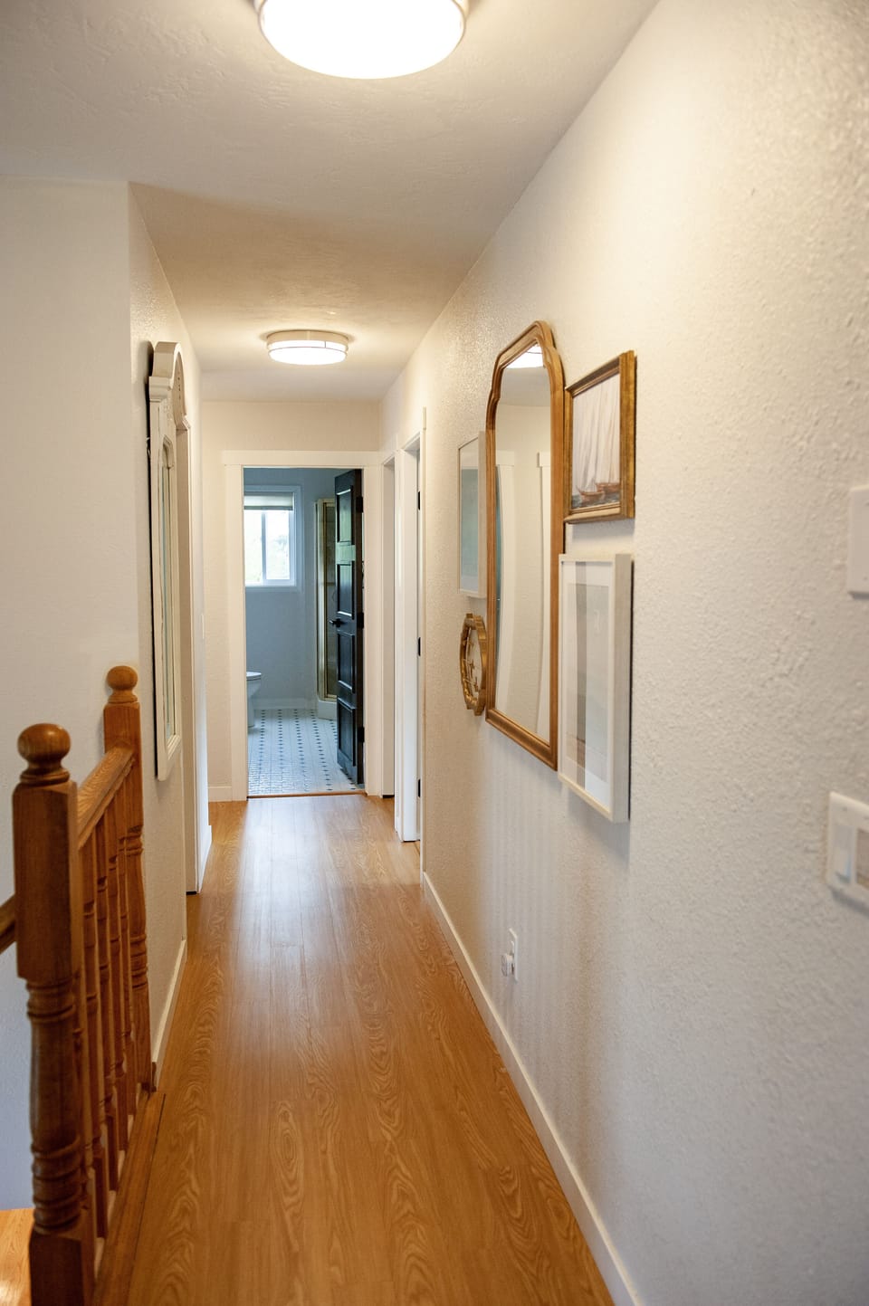 Upstairs hallway with 5 bedrooms and 2 bathrooms