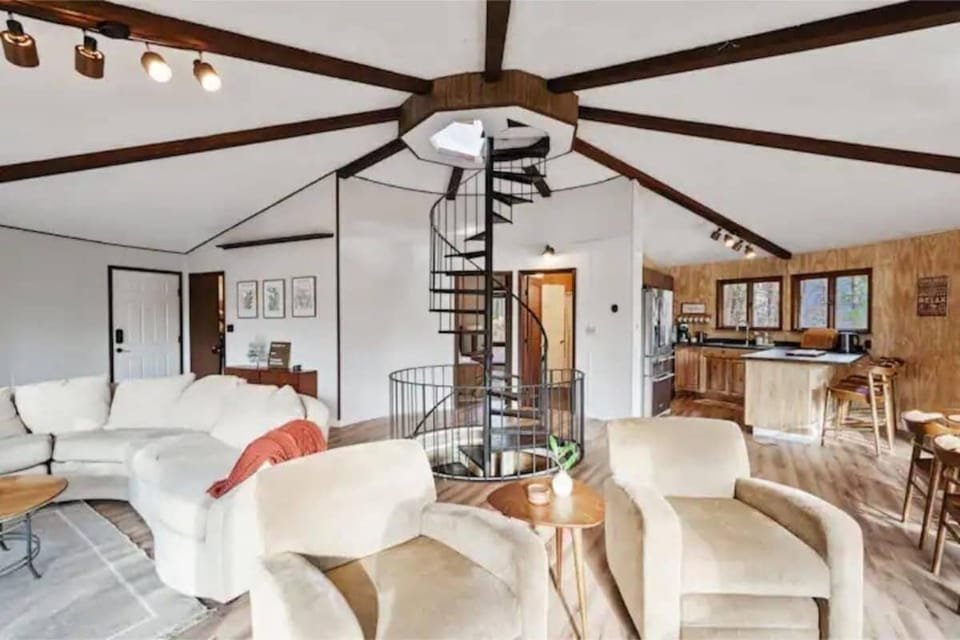 View of the open space living room area and kitchen.