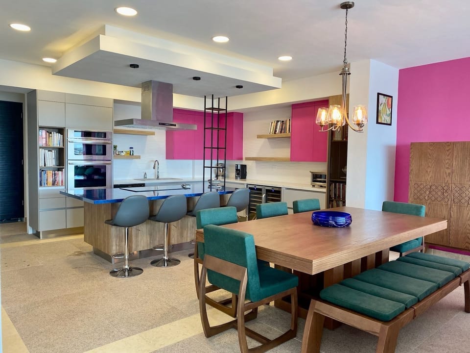 Open kitchen, dining area and living room upon entering the apartment. 