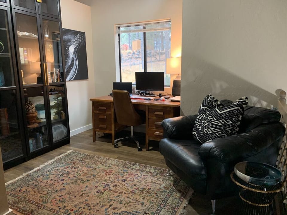Office space in the loft. Perfect for remote work if you need to. Gig Internet