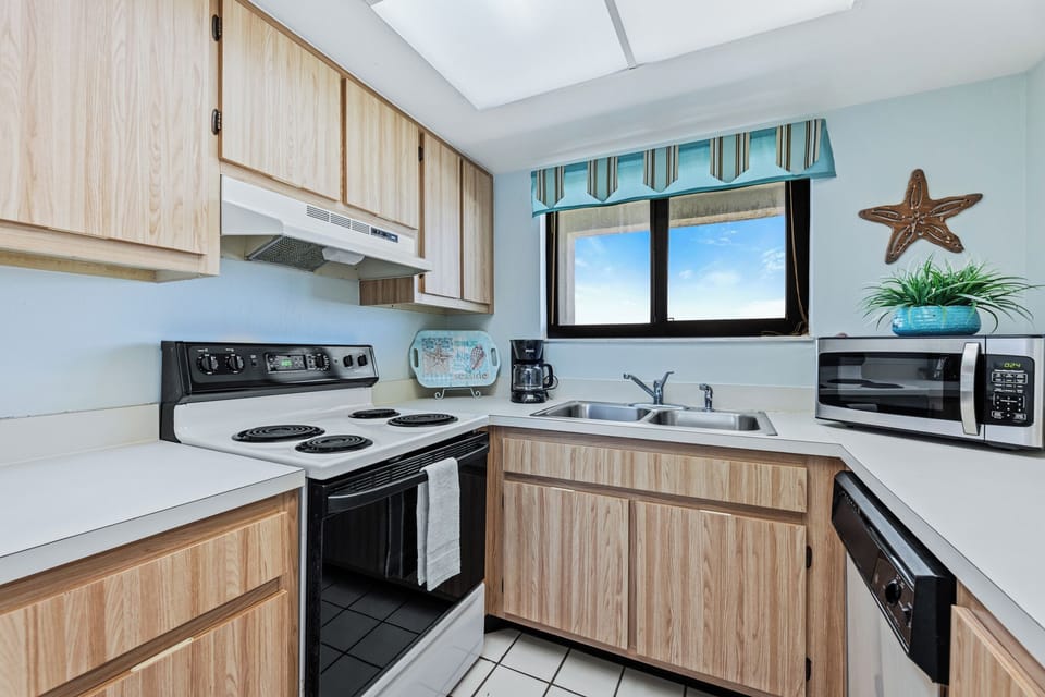 Cooking essentials include a crockpot, standard coffee maker, kettle, toaster, and blender.