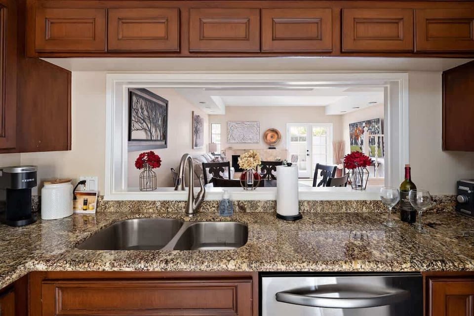 1st Floor: Fully equipped kitchen featuring stainless-steel appliances and completely stocked with all culinary essentials for ease and convenience during your stay.