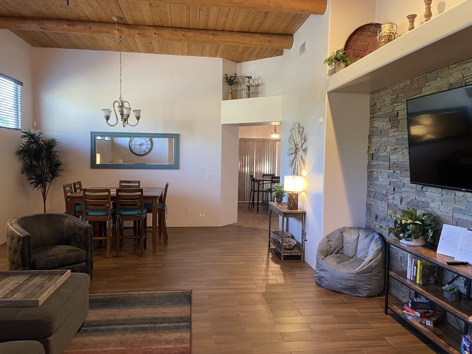 Living and Dining area. 65" Vizio Smart TV. Dining seats 6. 