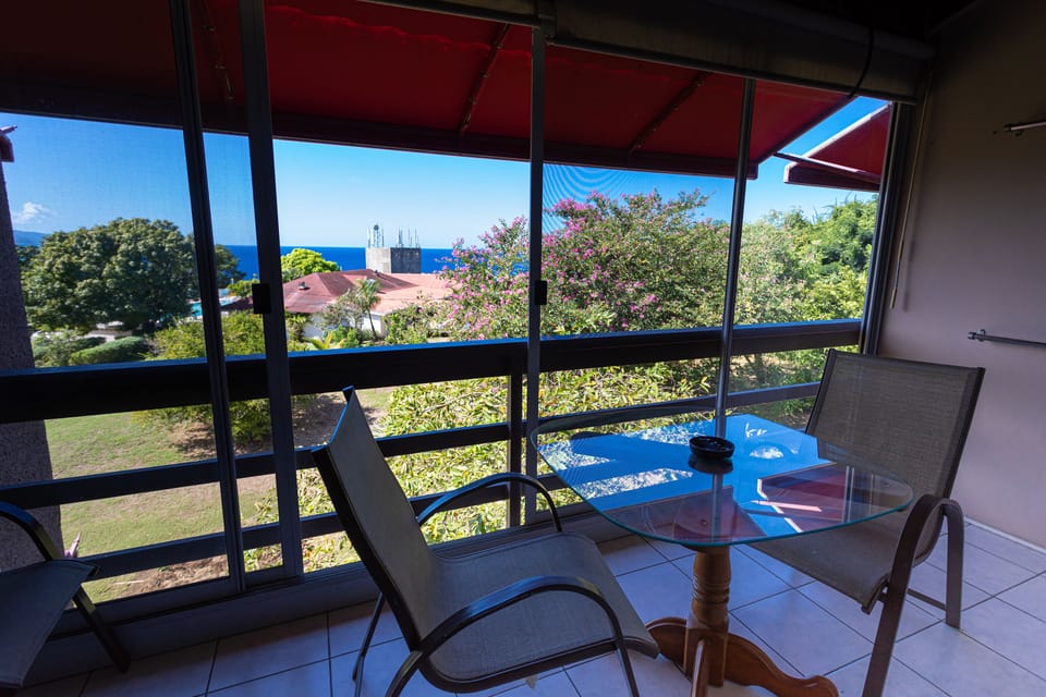 Shaded private balcony with Garden/Sea view