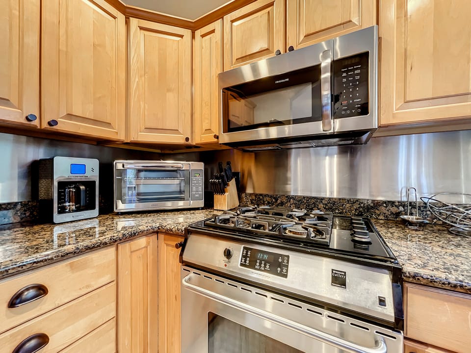 Well appointed kitchen with modern stainless steel appliances